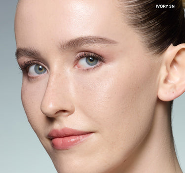 {Ivory 3n} Model wearing Morphe Wakeup Artist Under Eye Correcting Concealer in shade IVORY 3N, showing seamless under-eye coverage.