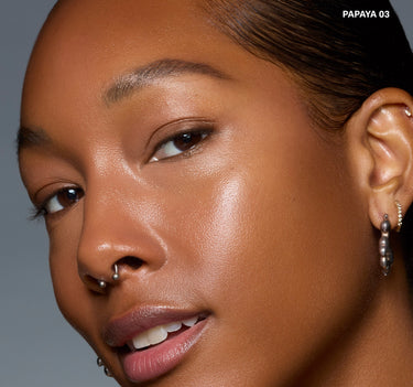 {Papaya 03} Model wearing Wakeup Artist Under Eye Correcting Concealer in shade PAPAYA 03 with luminous, glowing under-eye coverage.