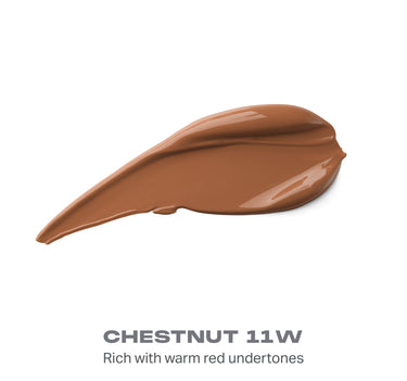 {Chestnut 11w} Wakeup Artist Under Eye Correcting Concealer shade swatch in CHESTNUT 11W — Rich with warm red undertones, creamy blended texture.