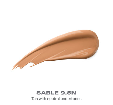 {Sable 9.5n} Wakeup Artist Under Eye Correcting Concealer swatch in SABLE 9.5N, Tan with neutral undertones, shown as a glossy creamy liquid smear.