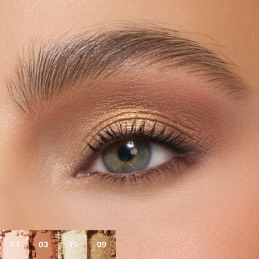{Flickering Sands} Close-up eye look using Chromaplus 12 Pan Eyeshadow Palette in warm earthy tones with gold shimmer; shade swatches labeled 01, 03, 05, 09.