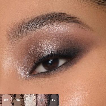 {Moon Stone} Model eye swatch showing Chromaplus 12 Pan Eyeshadow Palette shades 03, 04, 07, 08, 12; warm taupe and icy silver shimmer with smoked black liner.