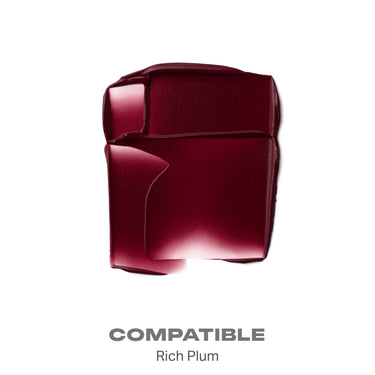 {Compatible} Soulmatte Velvet Lip Mousse shade swatch labeled COMPATIBLE Rich Plum, showing a deep burgundy velvet-finish smear.