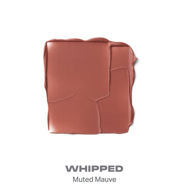 {Whipped} Soulmatte Velvet Lip Mousse texture smear labeled WHIPPED in Muted Mauve, a warm rose-brown matte shade.