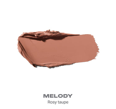 {Melody} Solo Artist Priming Cream Eyeshadow swatch in shade MELODY — Rosy taupe, showing a creamy rosy-taupe smear.