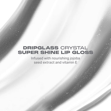 Morphe Dripglass Crystal Super Shine Lip Gloss product name over glossy texture background, infused with jojoba seed extract and vitamin E.