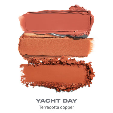 {Yacht Day} Cheek Thrills Multi-Finish Face Trio shade smear in Terracotta copper tones with text "YACHT DAY Terracotta copper." | Cheek Thrills Multi-Finish Face Trio - Yacht Day | Secondary image