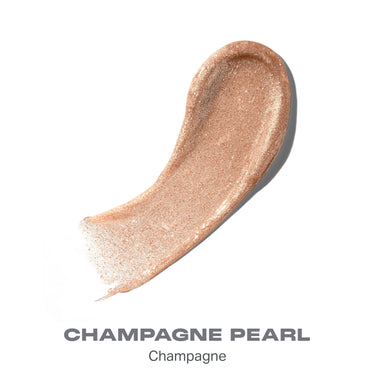 {Champagne Pearl} Dripglass Dazzled High Shimmer Lip Gloss texture smear in CHAMPAGNE PEARL — Champagne, a warm shimmery nude gloss.