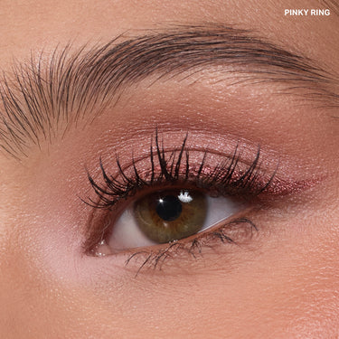 {Pinky Ring} Close-up eye macro wearing the Dazzling Metallics Eyeshadow Trio in shade PINKY RING, with rosy metallic shimmer on the lid.