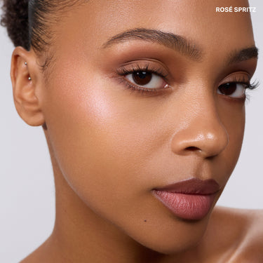 {Rose Spritz} Dreamlight Gelee Highlighter Stick worn on model