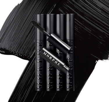 Morphe Make It Big Mini Volumizing Mascara group shot: black tubes engraved MORPHE arranged with wand and dark mascara swatches behind.